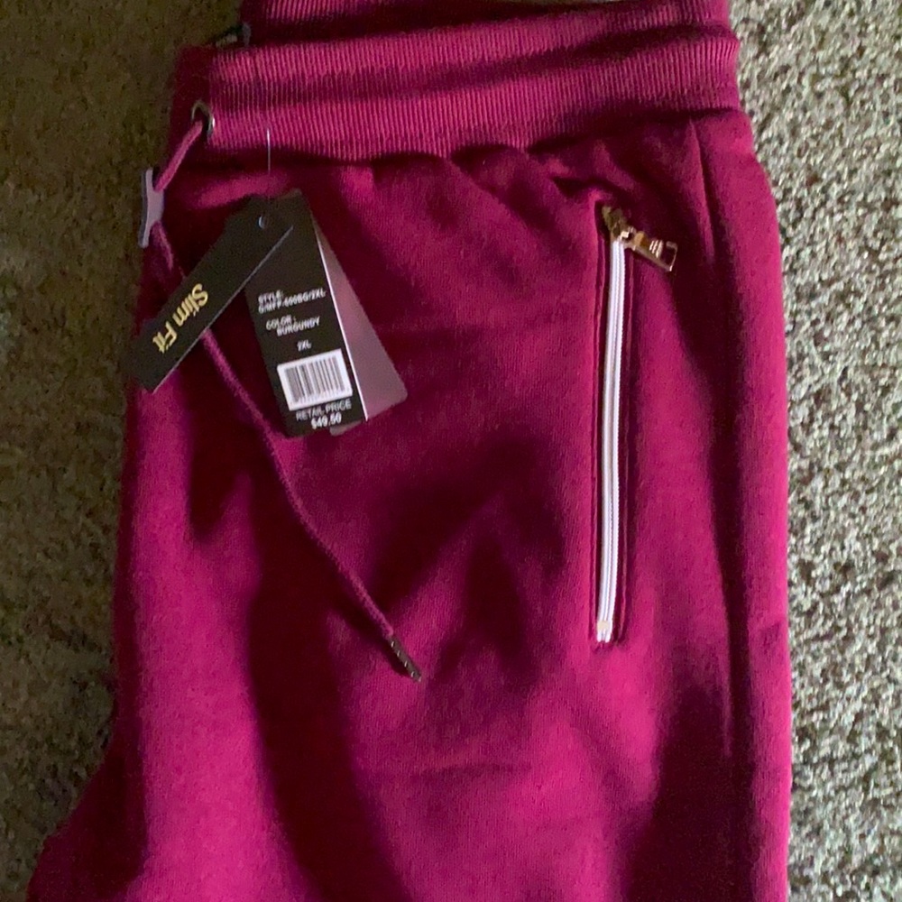 Brand new joggers with zippers